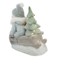 Northlight 15-in Beige And Green Lighted Boy On A Sled Christmas Decoration