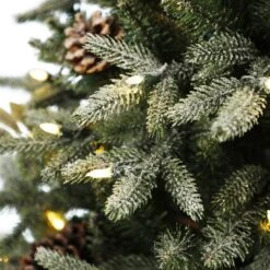 Holiday Living 4.5-ft Pre-Lit Artificial Harpersville Pine Potted Christmas Tree With 100 LED Lights